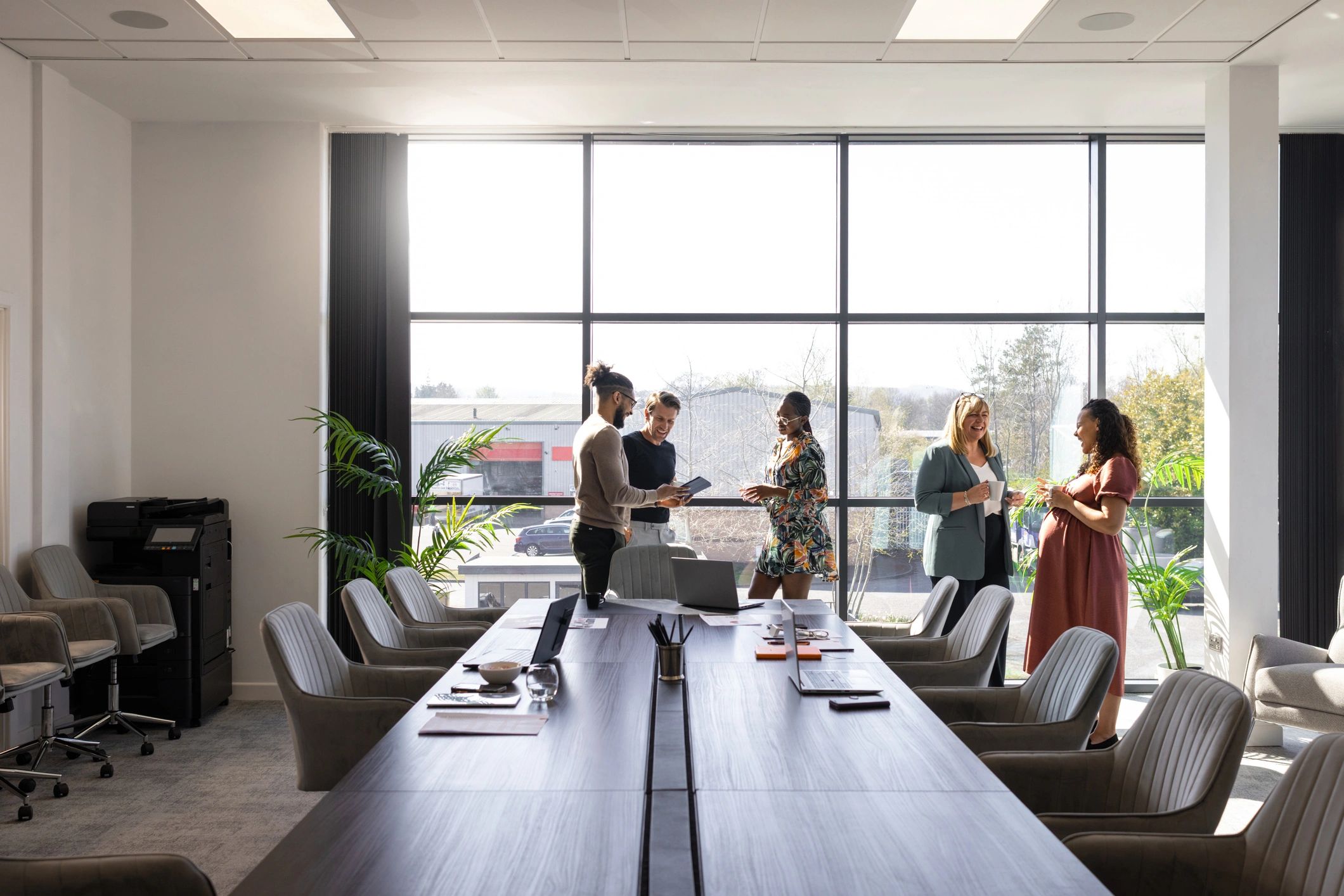 Professionals discussing plans in an office setting