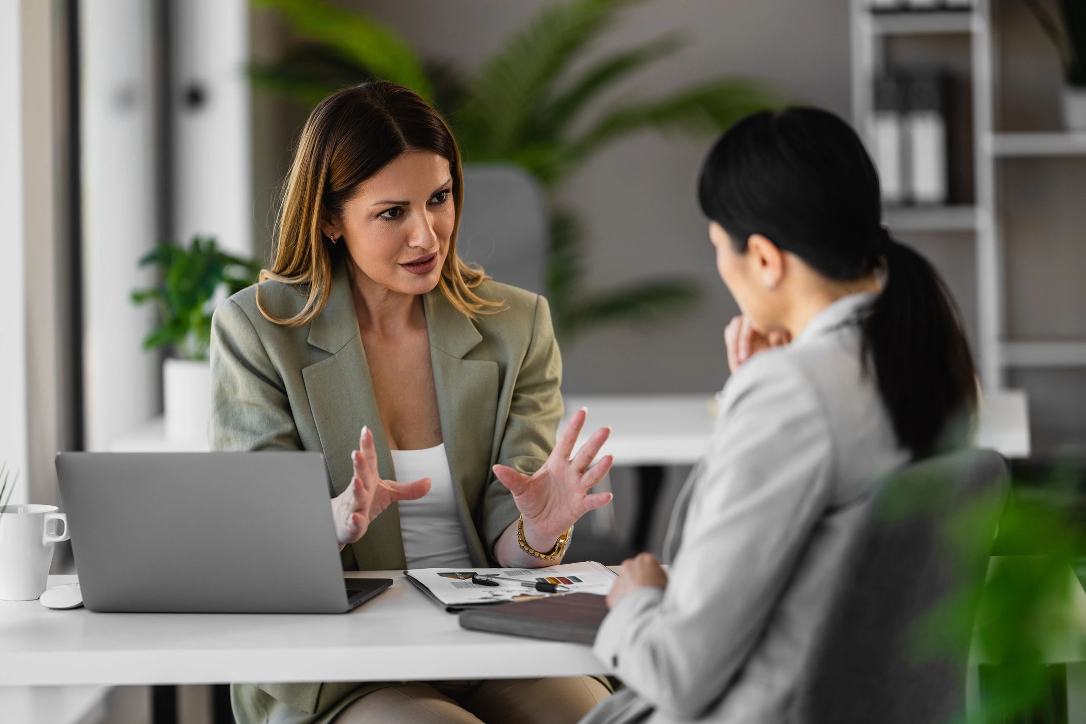 Advisor consulting with a client in a professional office
